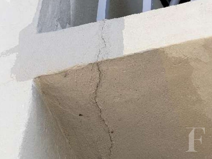 Spalled concrete, second floor