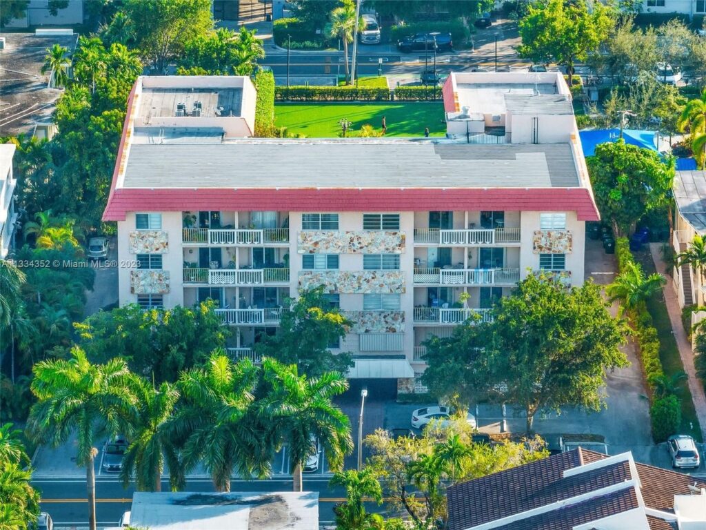 condominium building aerial view inspected for restoration engineering and building recertification services in Florida