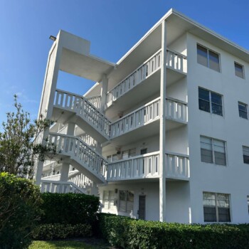 Ellesmere A condominium exterior stairway inspected for building recertification and structural safety assessment in Florida