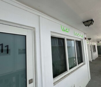 structural engineer inspection of condominium walkway for building condition assessment and safety compliance